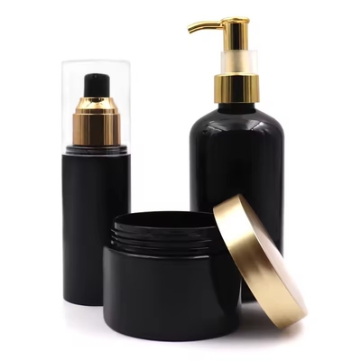 Botellas de plástico para cosméticos Botella de bomba de loción Botella con tapa dorada Botella de hombro redonda