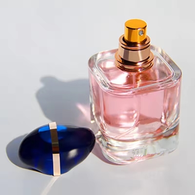 Venta al por mayor Botella de perfume vacía de spray cuadrado superior para mate con embalaje