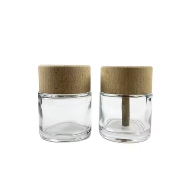 Botellas de vidrio transparente de difusor de 50 ml con tapa de madera Botellas de vidrio lujoso de perfume