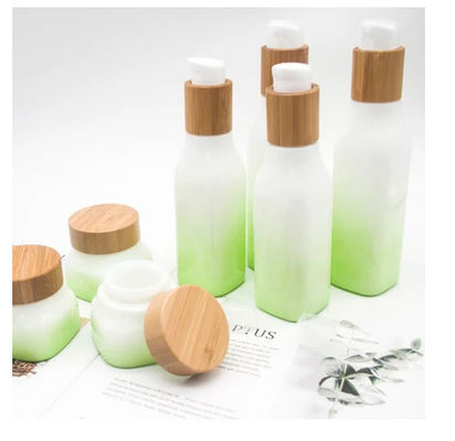 loción cosmética de cristal de las botellas de 100ml 43m m 43/410 tarro cosmético con las tapas de bambú