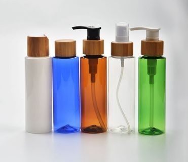 Los tarros cosméticos plásticos de las botellas de 4 onzas 120ml 500ml el 10in con las tapas abultan 63m m